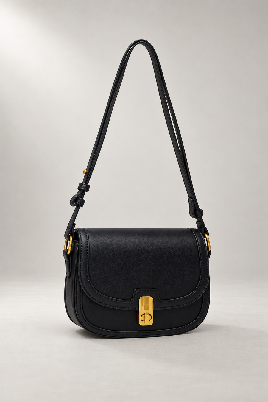 Lily Crossbody Bag — Turn Lock & Adjustable Strap — Black studio view