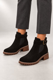 Vivienne Chelsea Boots — Buckle Strap & Block Heel — Black studio view