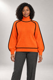 Marleno Turtleneck Sweater — Contrast Edge Detail — Orange studio view