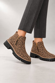 Raely Ankle Boots — Side Zip & Lug Sole — side view in our studio
