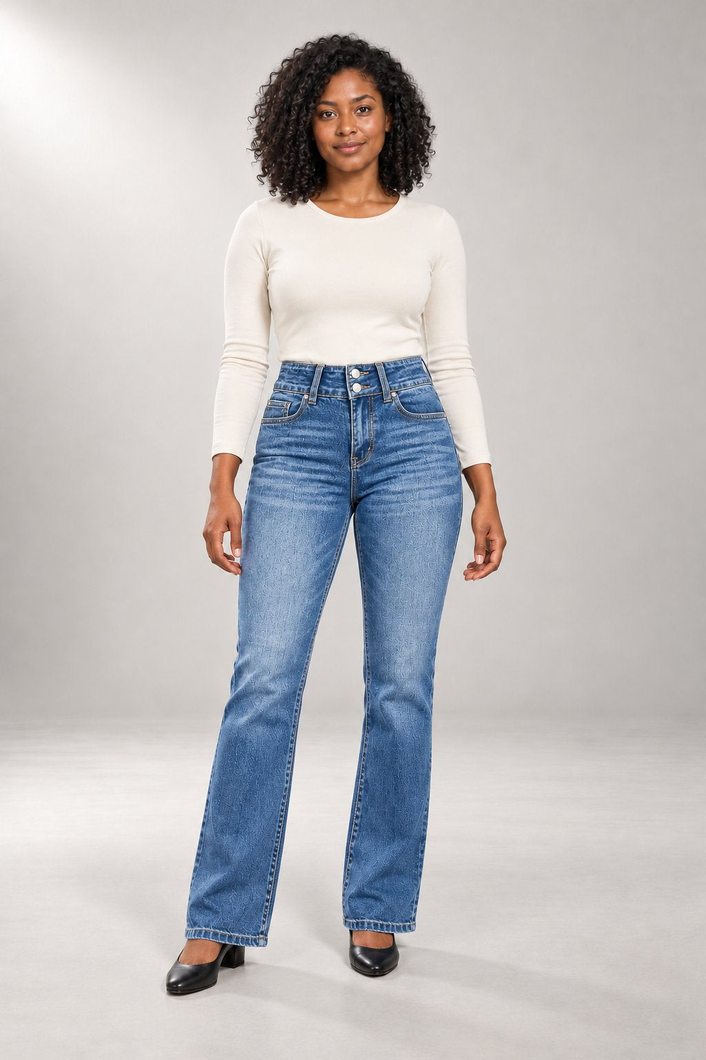 Janie Bootcut Jeans — High Waist & Double-Button Detail — Light Blue studio view