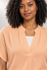Becca Blouse — Soft Drape & Minimalist V-Neck — detail view in our studio