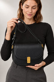 Lily Crossbody Bag — Turn Lock & Adjustable Strap — detail view in our studio