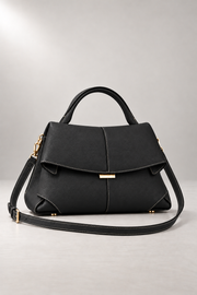 Matera Sculpted Handbag — Foldover Flap & Top Handle — detail view in our studio