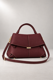 Matera Sculpted Handbag — Foldover Flap & Top Handle — Burgundy studio view